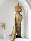 Lace Gown with Golden Shoulder – Elegance That Shines