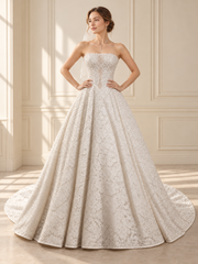 VVSIG-01 bridal gown — front view in warm ivory room