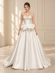 VVSIG-16 bridal gown — front view in warm ivory room